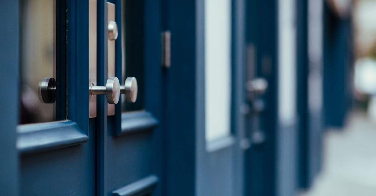 locksmith unlocking front door — Vault Locksmiths